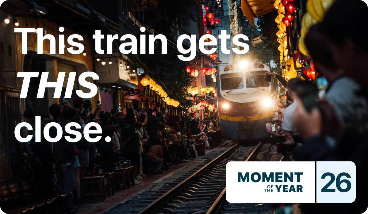 This train gets this close: a train passing the cafes on Hanoi's Train Street. Moment of the Year 2026