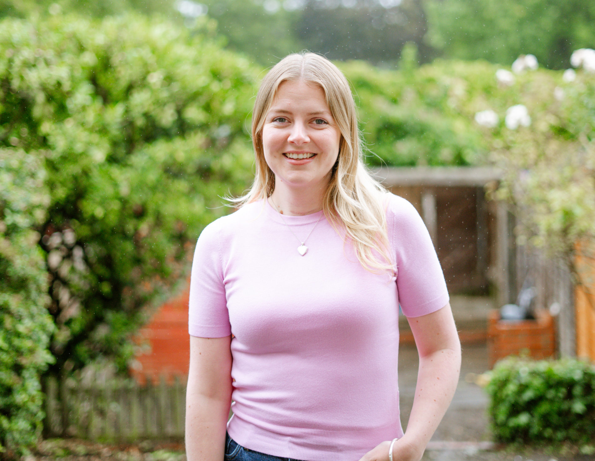 A photo of Dr Liz O’Riordan against a yellow background.